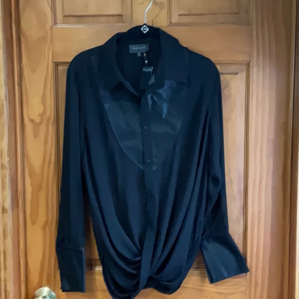 Blouson shirt with faux leather yoke and cuffs. Never worn